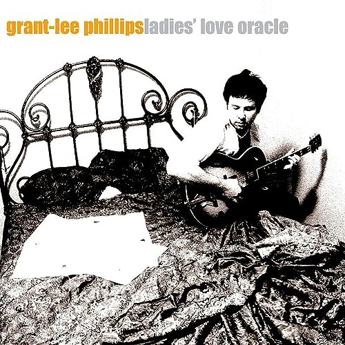 GRANT-LEE PHILLIPS - LADIES' LOVE ORACLE (25TH ANNIVERSARY) (TRANSLUCENT ORANGE VINYL)