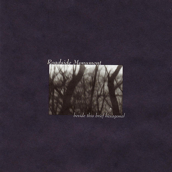 ROADSIDE MONUMENT  - BESIDE THIS BRIEF HEXAGONAL