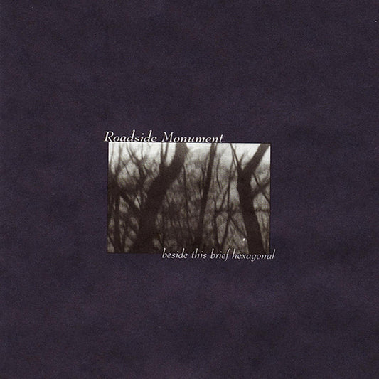 ROADSIDE MONUMENT  - BESIDE THIS BRIEF HEXAGONAL